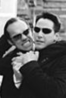 Full throttle: Agent Smith (Hugo Weaving) and Neo 
    (Keano Reeves).