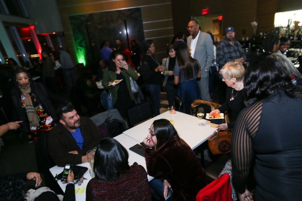 Happy Photos From the Annual Holiday Mixer at Bar 32