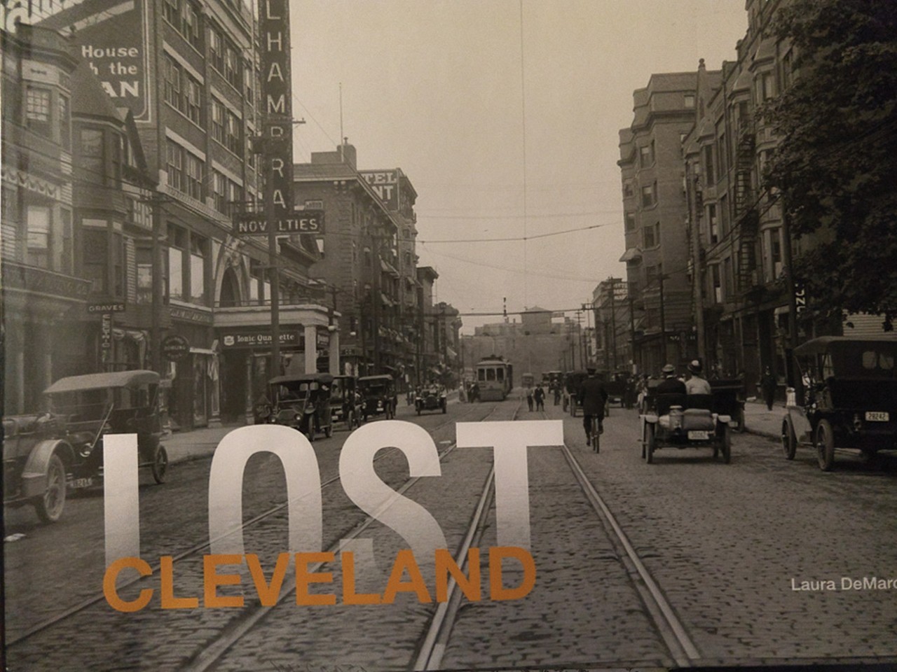 A Copy of Lost Cleveland
Organized chronologically,&nbsp;Lost Cleveland, a new coffee table book featuring photos of old Cleveland institutions that no longer exist, includes photos from places such as Leo&#146;s Casino, the Hippodrome, Hough Bakery, Cleveland Municipal Stadium and Memphis Drive-In.&nbsp;Plain Dealer&nbsp;reporter Laura DeMarco did the painstaking research and wrote the copy that accompanies the vintage photos.&nbsp;The coffee table book chronicles the &#147;iconic architecture, legendary events, and fascinating true tales behind a city that was one of the largest and most prosperous in America.&#148;&nbsp;With 65 entries and more than 200 photos, the 144-page&nbsp;hardcover book is a nostalgic blast from the past and perfect for the history nut in your life.