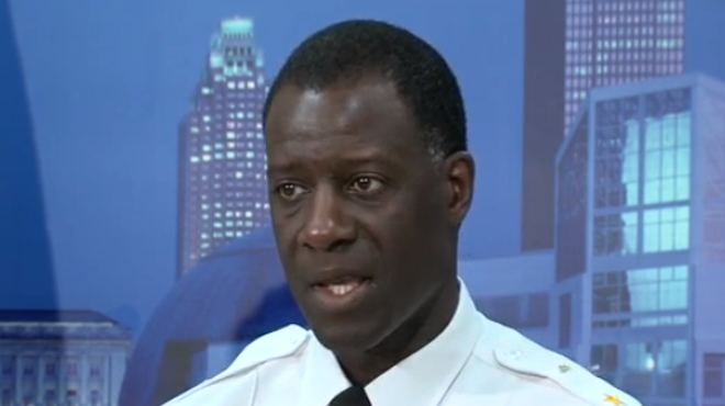 Police Chief Calvin Williams sheds tears as he discusses the recent shootings in Cleveland.