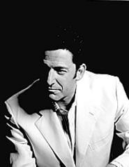 If his father had been a plumber, John Pizzarelli would - be fixing toilets instead of touring jazz clubs.