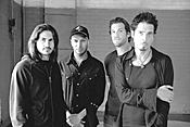 In grade school, Audioslave guitarist Tom Morello - (second from left) was thought by some to be an - African prince.