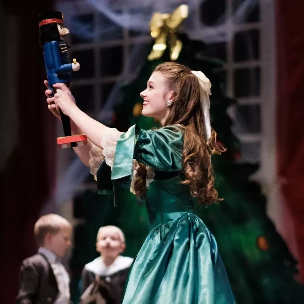 Clara receives her Nutcracker at the family Christmas party.