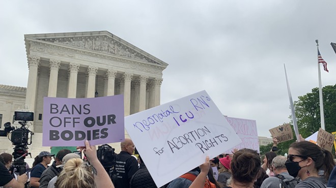 Abortion rights activists protest outside the U.S. Supreme Court Tuesday.