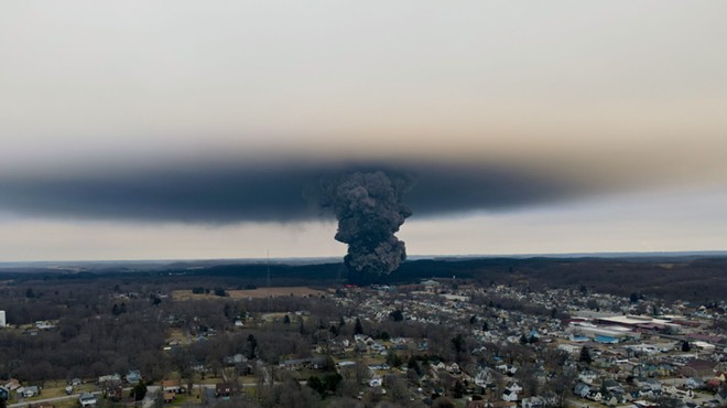 A black plume of smoke rises over East Palestine, Oho during a “controlled burn” on Feb. 6, 2023.