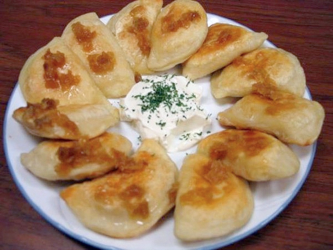 Pierogi
What: Those wonderful potato-and-cheese stuffed dumplings
Why: Cleveland's Eastern European immigrants brought them generations ago, and they've been a beloved staple of the city's cuisine ever since
Where: Your first stop should be Sokolowski's University Inn, whose name has become synonymous with the dish. Also hit Parma's Perla Homemade Delight, where dozens of flavors are sold by the, well, dozen