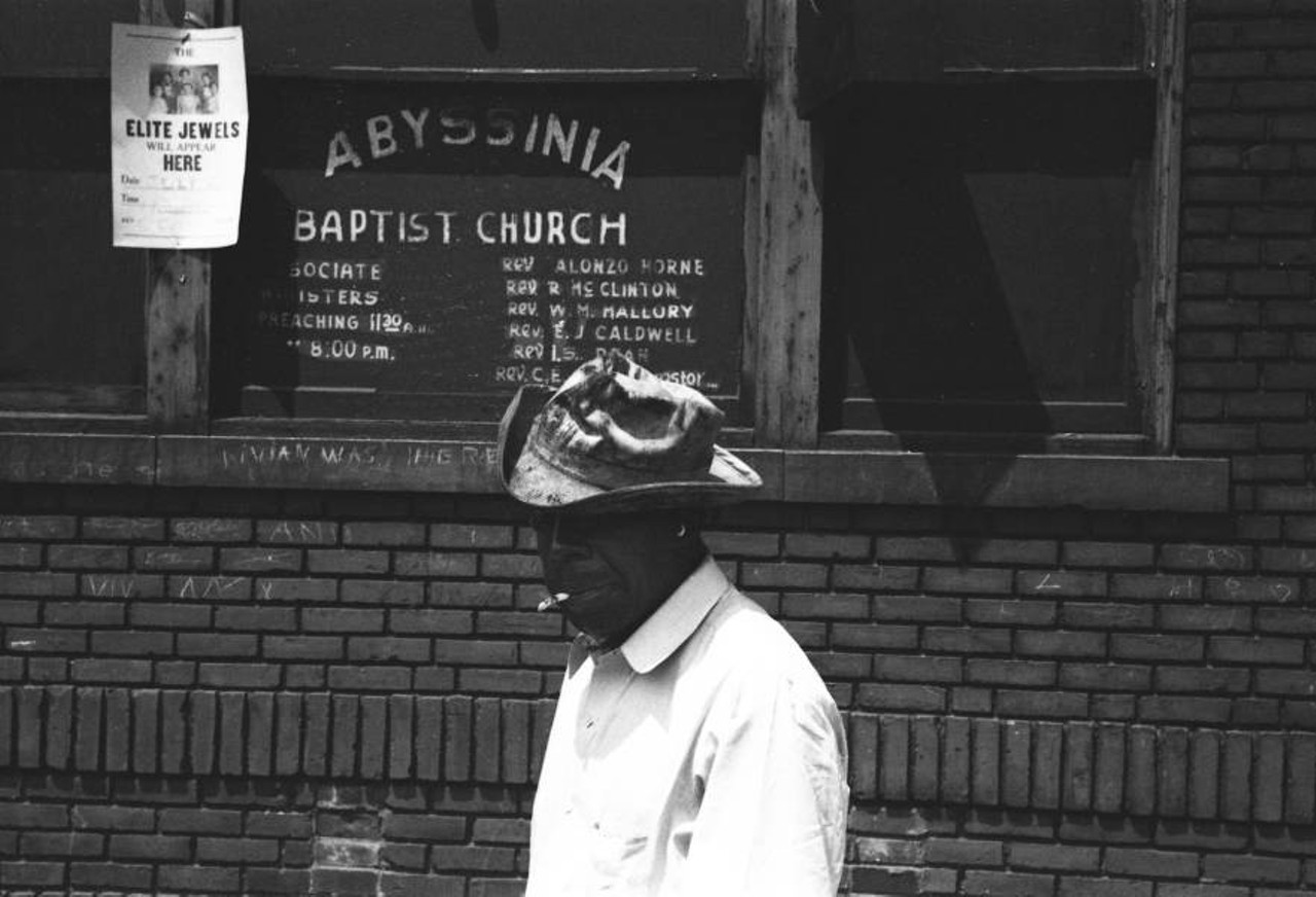 Man Smoking in Front of Abyssinia Baptist Church