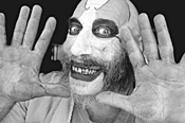 Sid Haig plays the scary daddy of a very scary Baby.