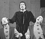 Steve Tague (center, with Rosencrantz and - Guildenstern) makes an appropriately gaunt Hamlet.