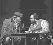 Tevye (Tom Fulton, left) and Lazar Wolf (Noah Budin), - basking in their "gotcha" moment.
