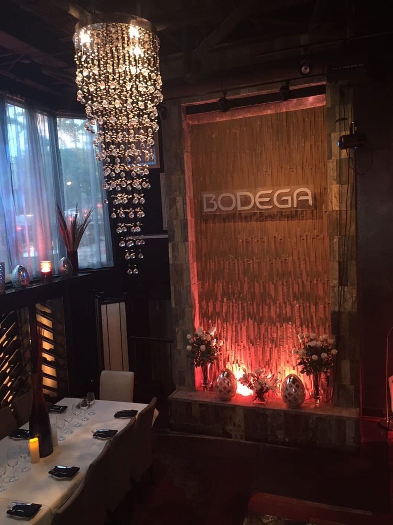  Bodega
1854 Coventry Rd., Cleveland Heights 
Set a few steps below street level (in the former Utrecht Art Supplies space), Bodega greets guests with a sleek waterfall, handsome wood floors and shimmering linens, and offers top-flight beers and a staggering amount of martinis and wines. The kitchen turns out cold tapas like stuffed grape leaves, scallop ceviche and beef carpaccio, and hot plates like bruschetta, paella and mussels in saffron. “I love Miami,” says owner Said Ouaddaadaa. ”I thought, why not bring Miami to Cleveland?”