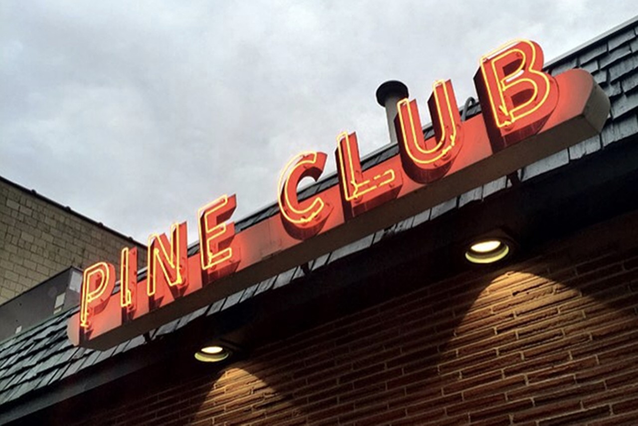 The Pine Club
1926 Brown St., Dayton, 937-228-7463
The Pine Club has been a Dayton main-stay since 1947. The accidental David Lynch fever dream steakhouse features a low-slung 1960s brick exterior, green awning and red neon signage. The Midcentury menu has zero concern for anyone&#146;s arteries: vegetables are topped with hollandaise, marinated herring with sour cream comes as an appetizer and dinners like extra heavy filet mignon or the calves liver and sauteed onions include their famous stewed tomatoes. Their signature Pine Club Red & Bleu Cheese dressing is basically French dressing with chunks of Roquefort and is a must-try. The restaurant is cash only, so come prepared. 
Photo via anotherpintplease/Instagram