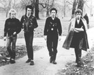 The Sex Pistols unwind with a stroll in the park.