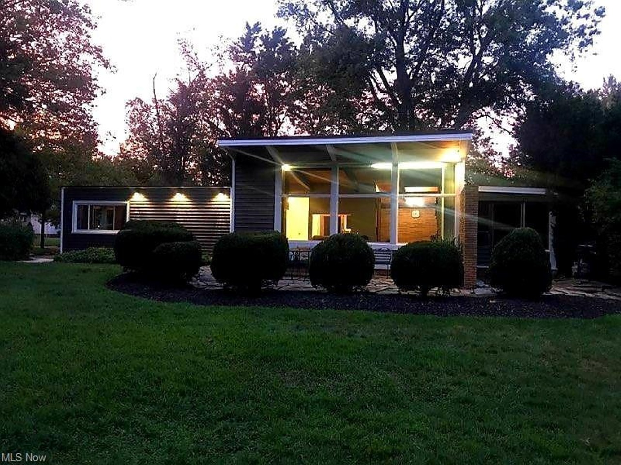 This Cute Mid-Century Ranch In Parma Heights With a Pool And  Pizza Oven Just Hit The Market For $194,000