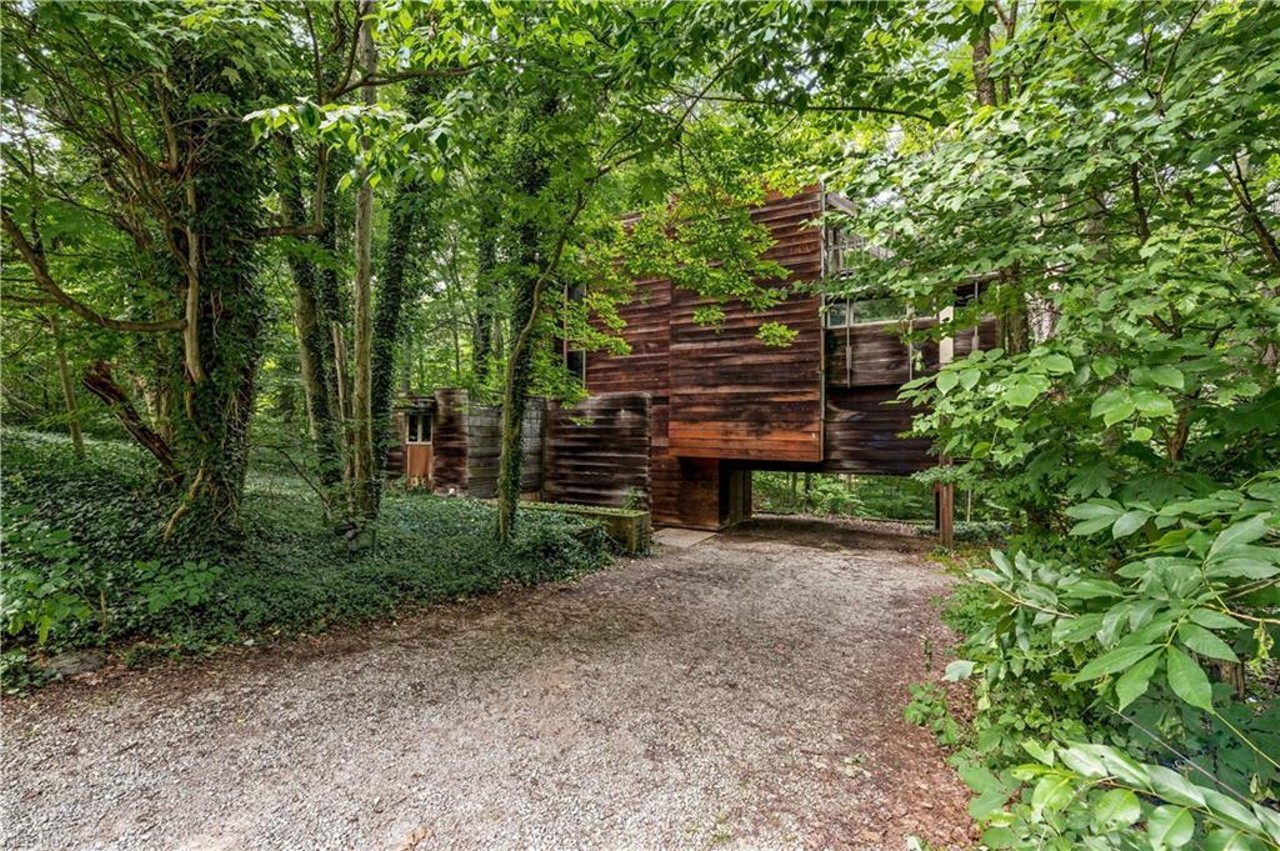 This Frank Lloyd Wright-Esque Treehouse In The Woods In Copley Is On The Market For $299,000