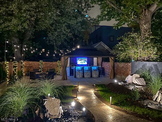 This Newly Listed $350,000 Duck Island Home Comes With A Backyard Bar Built for Entertaining