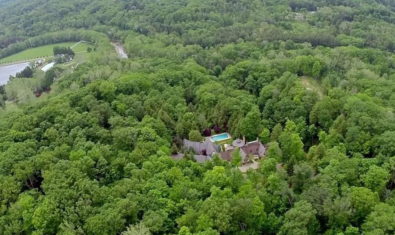 This Sprawling, Secluded English Country Manor in Gates Mills, With Indoor and Outdoor Pools, is the Escape We All Deserve