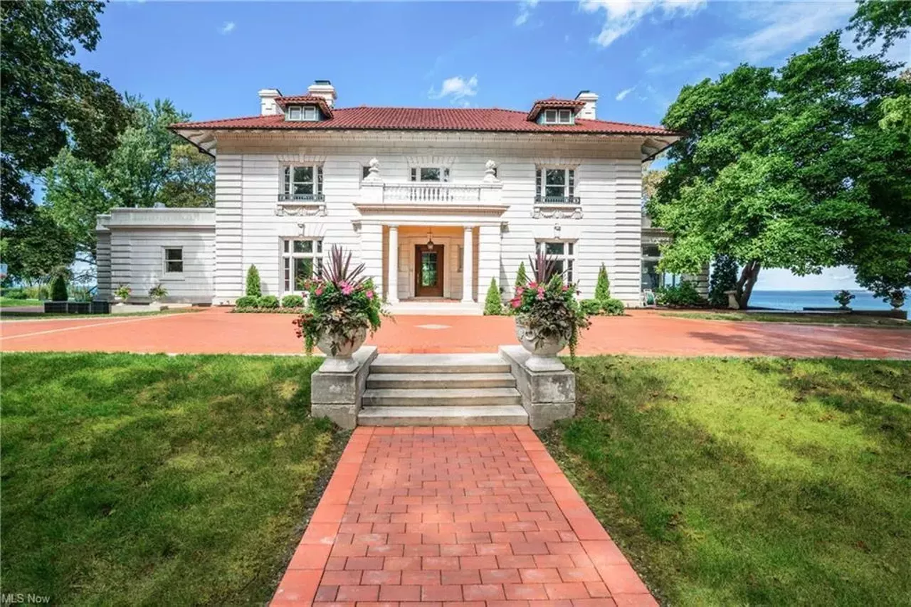 This Stately Lakefront Mansion In Edgewater Has a Sauna, Elevator and