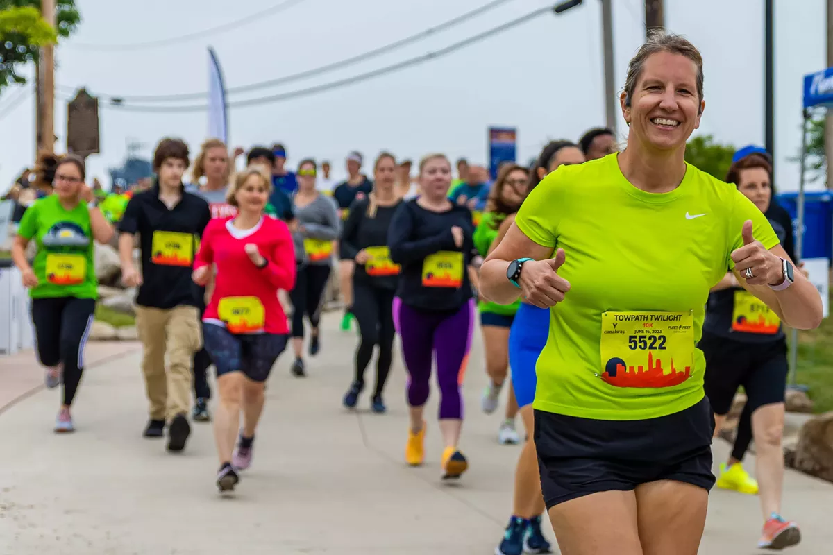 Runners on the Towpath Trail at the 2023 Towpath Twilight