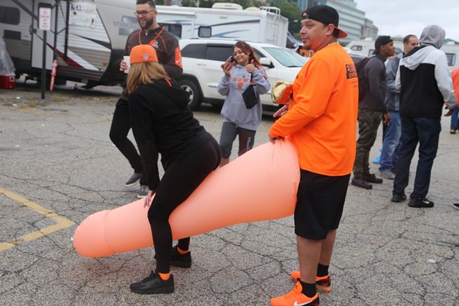 The Browns vs. Steelers game was the No. 1 trending topic on Google this year in Ohio. This photo shows Browns fans gearing up in the Muni Lot  for a game against the Steelers back in 2018. - PHOTO BY EMANUEL WALLACE
