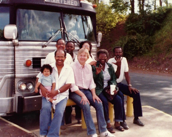 Williams, holding his daughter Carla, and next to Plain Dealer reporter Joe Frolik, on the way to the 1983 National Black Deaf Advocates conference in Philadelphia, PA.