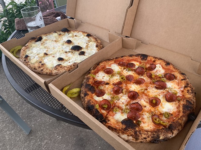 A pair of pies from Cent's Pizza in Ohio City. - Matthew T