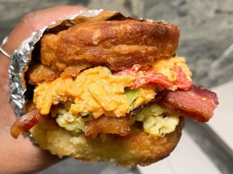 A breakfast sandwich from Roaming Biscuit. - Roaming Biscuit