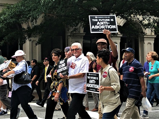 Anti-abortion demonstrators march. - (Photo by Robert Zullo/ States Newsroom).