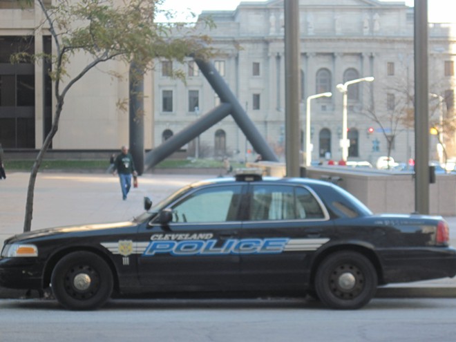 Cop car outside the justice center. - SCENE ARCHIVES