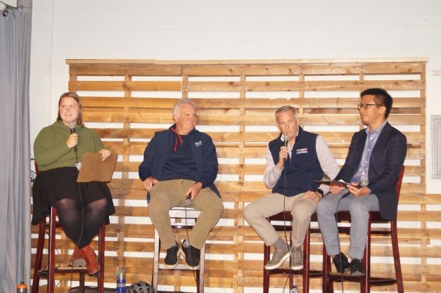 Chris Ronayne (left center) and Lee Weingart (right center) speaking to the Goldhorn Brewery crowd at a public transportation forum, (10/13/22). - Sam Allard / Scene
