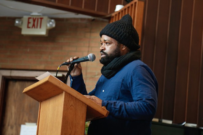 Bishop Chui, board president of the Northeast Ohio Coalition for the Homeless, speaks at St. Paul's Community Church in Ohio City Wednesday. - Mark Oprea