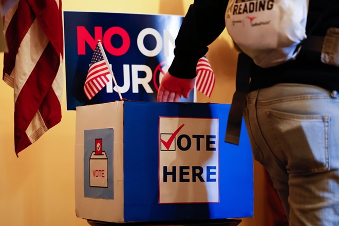 COLUMBUS, OH — DECEMBER 13: Representatives from multiple organizations opposed to HJR 6 cast ballots in a mock election at a press conference, December 13, 2022, at the Ohio Statehouse. - (Photo by Graham Stokes for Ohio Capital Journal)