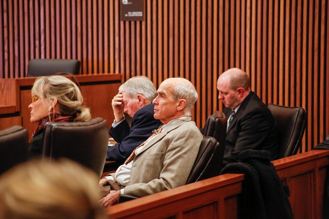 Brooks Jones (center) and Mika Jones (left) in court Thursday. Jones had claimed for the past seven years that his neighbor Paul Schambs' backyard pizza oven was a public nuisance. A jury denied that in their verdict. - Mark Oprea