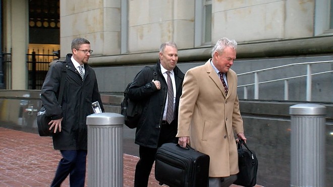 Center, former Ohio Republican Party chair, and statehouse lobbyist, Matt Borges with his attorneys outside of the federal courthouse. - Photo courtesy of WEWS.