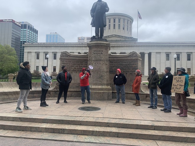 About 20 people protested against Senate Bill 83 outside of the Statehouse on May 3, 2023. - Photo by Megan Henry for Ohio Capital Journal.