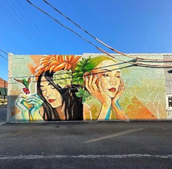 The latest of Asiatown's 13 murals, painted by local artist Suphitsara Buttra. - MidTown Cleveland