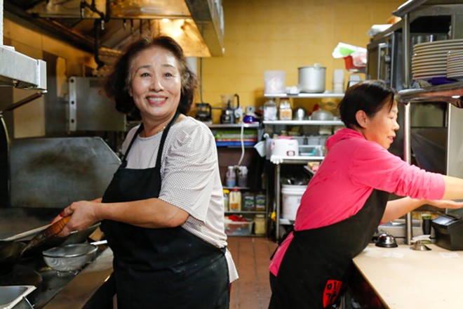 Cooks at Miega on Thursday. The restaurant was one of the cohort to win grant money. - Mark Oprea