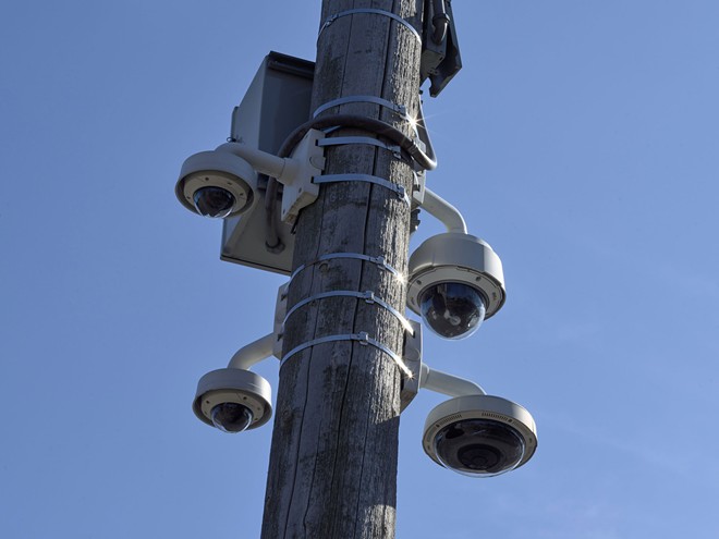 Four surveillance cameras are at the intersection of West Boulevard and West 101st Street in Cleveland. - Ross Mantle for The Marshall Project