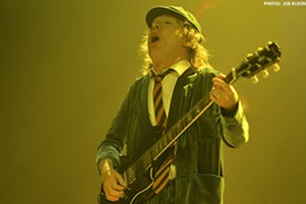 Axl Rose Capably Leads AC/DC's Triumphant Return to Town