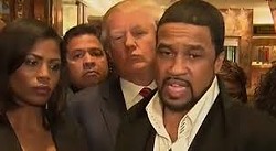 The Rev. Darrell Scott, with Donald Trump looming in the background. - CNN STILL