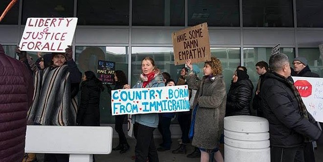 Emergency rally against the proposed travel ban at Cleveland-Hopkins Airport on Jan. 27. - April Bleakney
