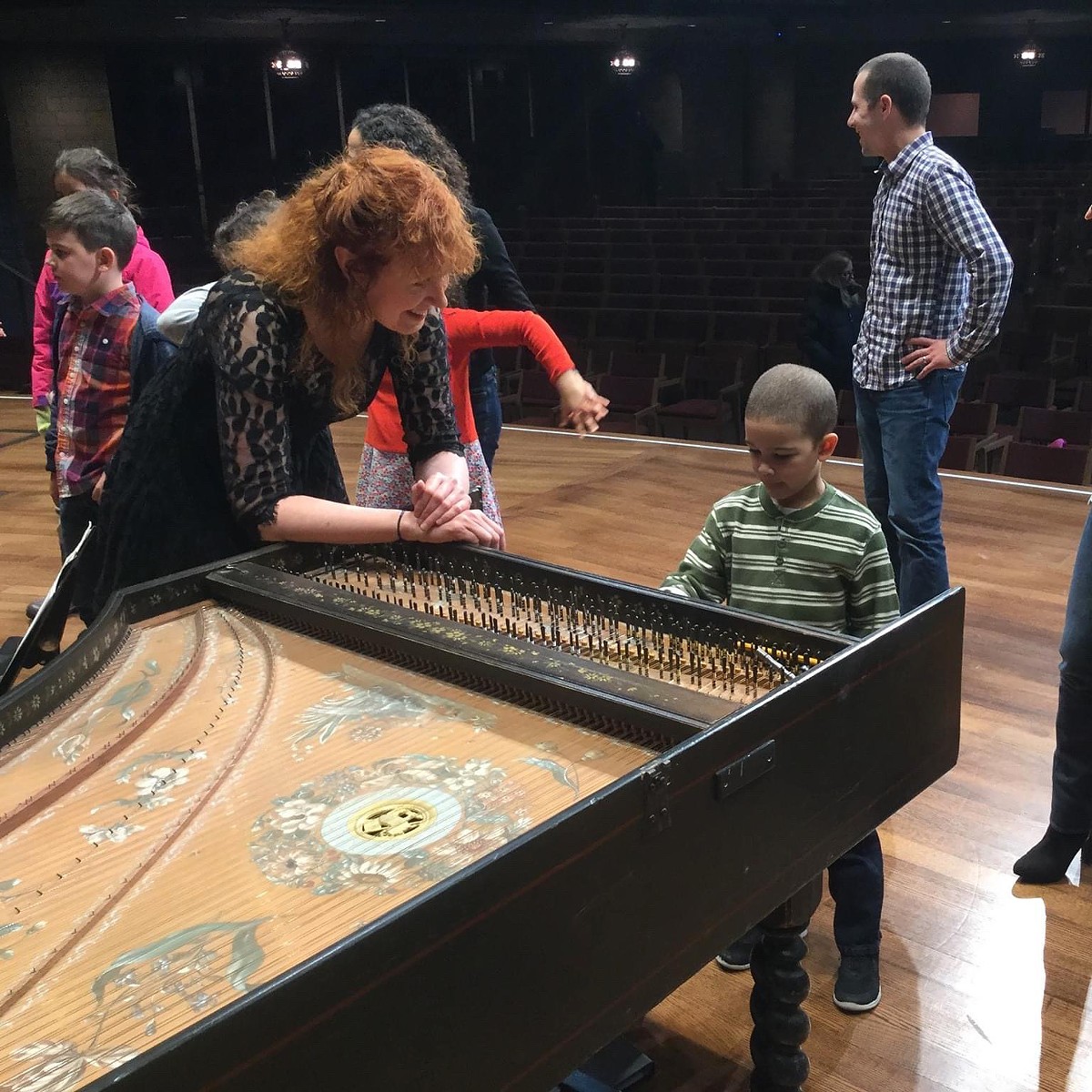 Jeannette Sorrell chats with a young family concert attendee