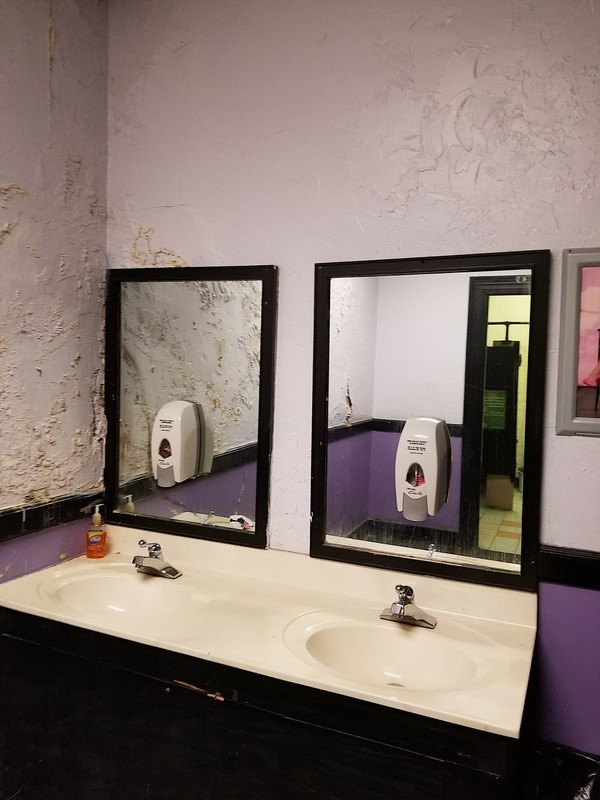 The first floor bathrooms before renovations - COURTESY OF AEG PRESENTS