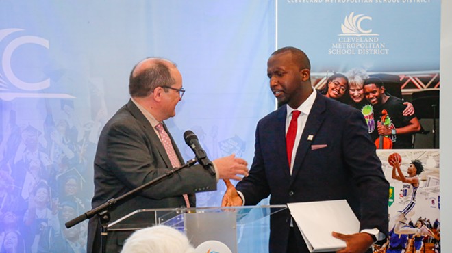Eric Gordon, the soon-to-be former CEO of the Cleveland Metropolitan School District, hands off the baton to his replacement, Warren Morgan