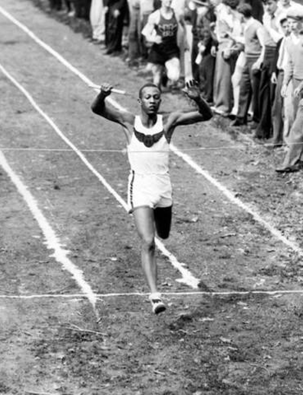 Photos Olympian Jesse Owens Dominating the Track & Field Competition