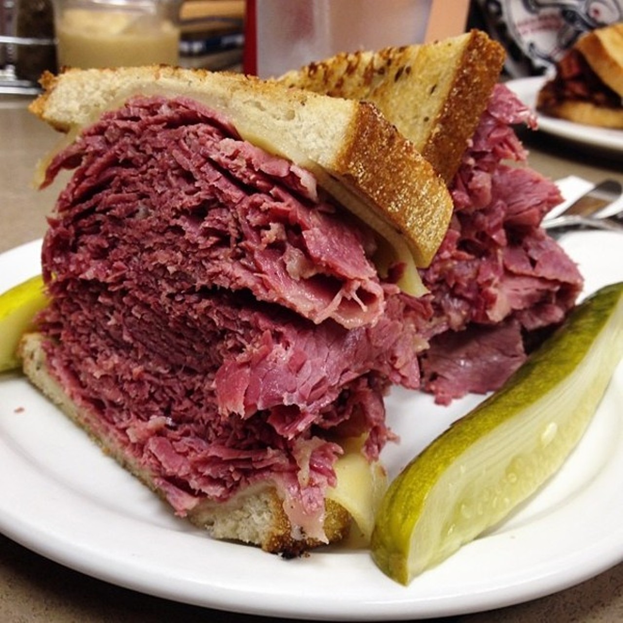  Corned Beef Sandwich at Slyman&#146;s
3106 St. Clair Ave., Cleveland
16 tons and what do you get? The best corned beef sandwich in Cleveland and it&#146;s only 15 bucks. They still slice every sandwich to order, and every sandwich still towers above much of the competition. Amaze your friends by ordering in Slymaneze: a &#147;natural&#148; means plain; &#147;original&#148; comes with mustard; and &#147;Smurf&#148; buys you one with Swiss and mustard (which ain&#146;t kosher, by the way).
Photo via Scene Archives