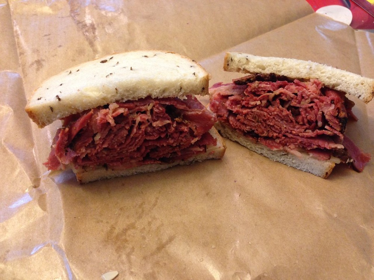 Mister Brisket | 2156 S. Taylor Rd, Cleveland Heights 44118 | 216-932-8620 | Delivery charge varies, will not exceed $5
Mister Brisket, a family owned carry out sandwich shop and deli, continues to be in the conversation for the best corned beef and pastrami in Cleveland. Order on a Tuesday and get $1 off any large sandwich. Sadly, Mister Brisket only offers lunch delivery but Mister Brisket's  boxed lunches include a sandwich (scooby, large or extra-large), chips, cookie, pickle and a drink. Mister Brisket's hours vary so always check the website before ordering. (Photo courtesy of Yelp! user Jeev D.)