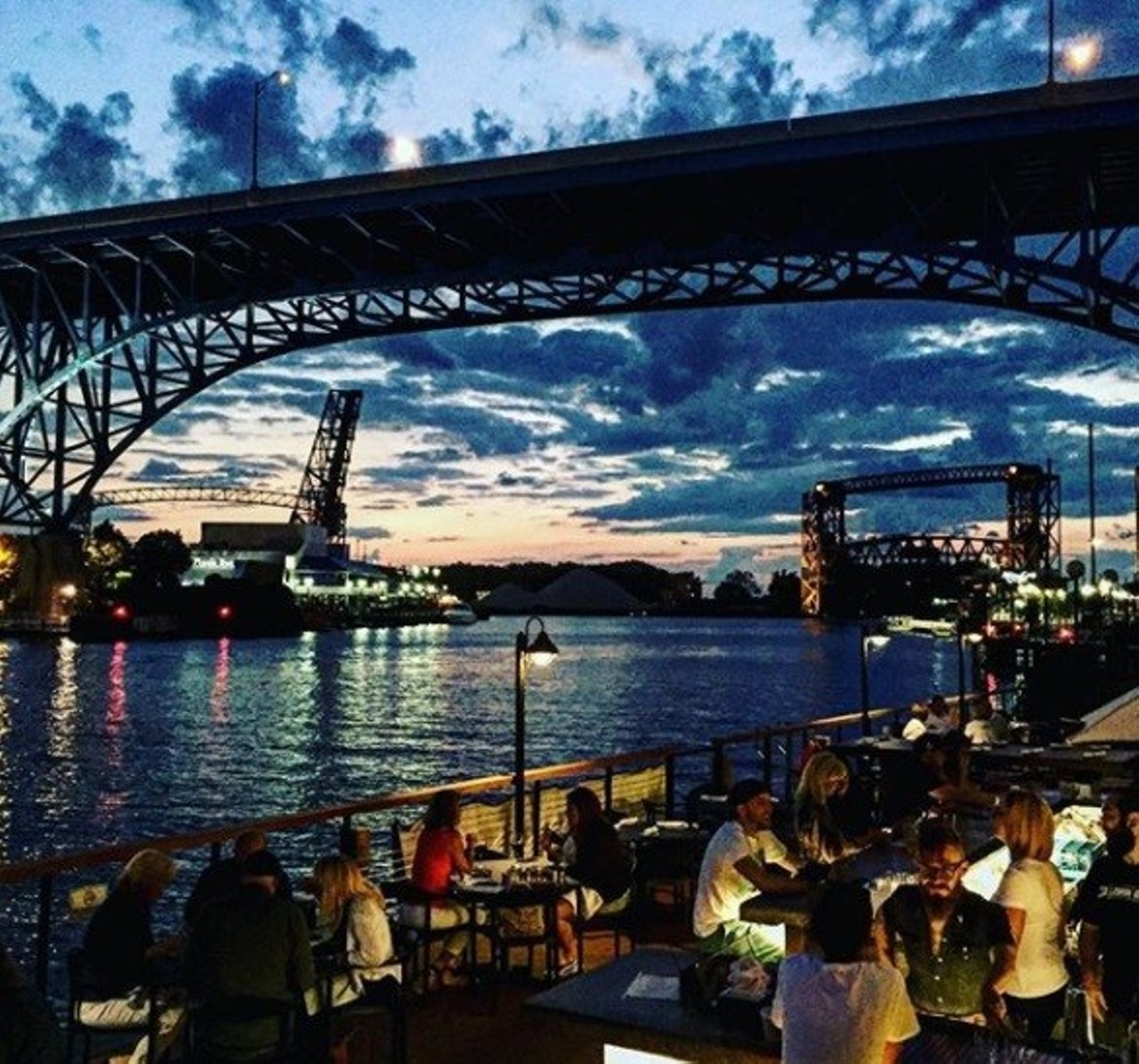  On the River in the Flats 
There are so many places to take a great shot for social media down in the Flats along the river. You can take a shot at a concert at Nautica, in front of a barge or at one of the bars along the river.
Photo via Scene Archives