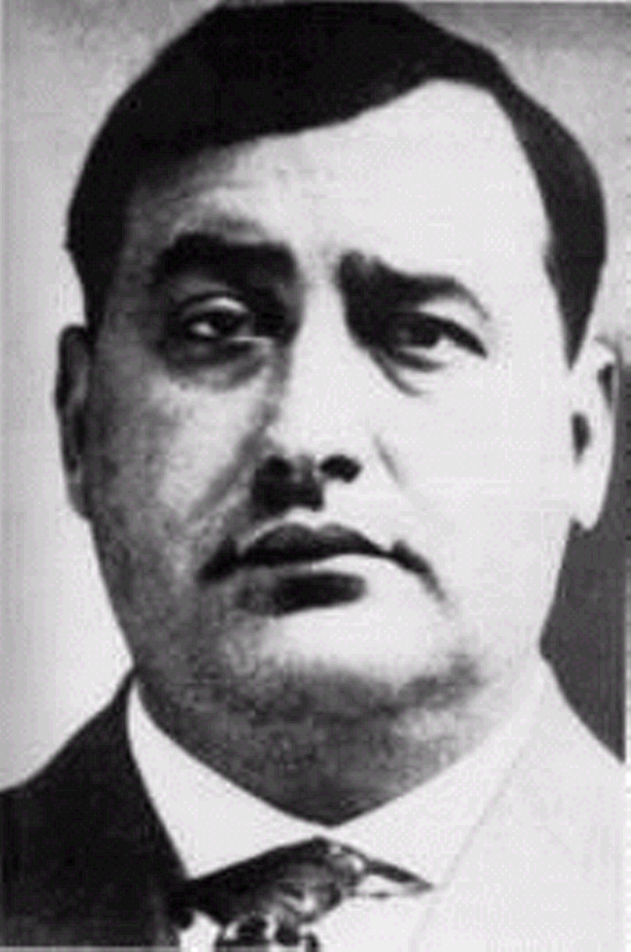 Joseph "Big Joe" Lonardo
(1920-1927) - Joseph Lonardo, a native of Sicily, was first thought to be in the States at the turn of century. Documents support this fact of his arrival. When Prohibition really took effect in 1920, Joe Lonardo didn't move directly into bootlegging and focused on corn sugar. The commodity was a needed material in producing the illegal beverage.
In the spring of 1927 Lonardo set sail for his homeland. He left much of the operations to Salvatore Todaro. What Lonardo and his faithful soldiers didn't know was the Todaro had formed an alliance with other groups. Upon his return Lonardo was gunned down on October 13, 1927 in a local Cleveland barbershop. His faithful brother John wasn't spared either and their murders sparked the Corn Sugar Wars.
