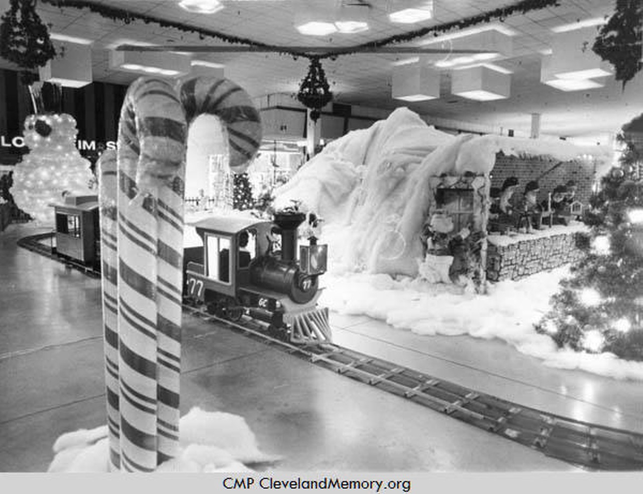 Westgate Mall holiday display, featuring giant candy canes and miniature locomotive. 1979